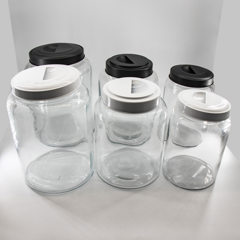 Venta al por mayor de almacenamiento de vidrio de almacenamiento de frascos con tapas metálicas para la cocina